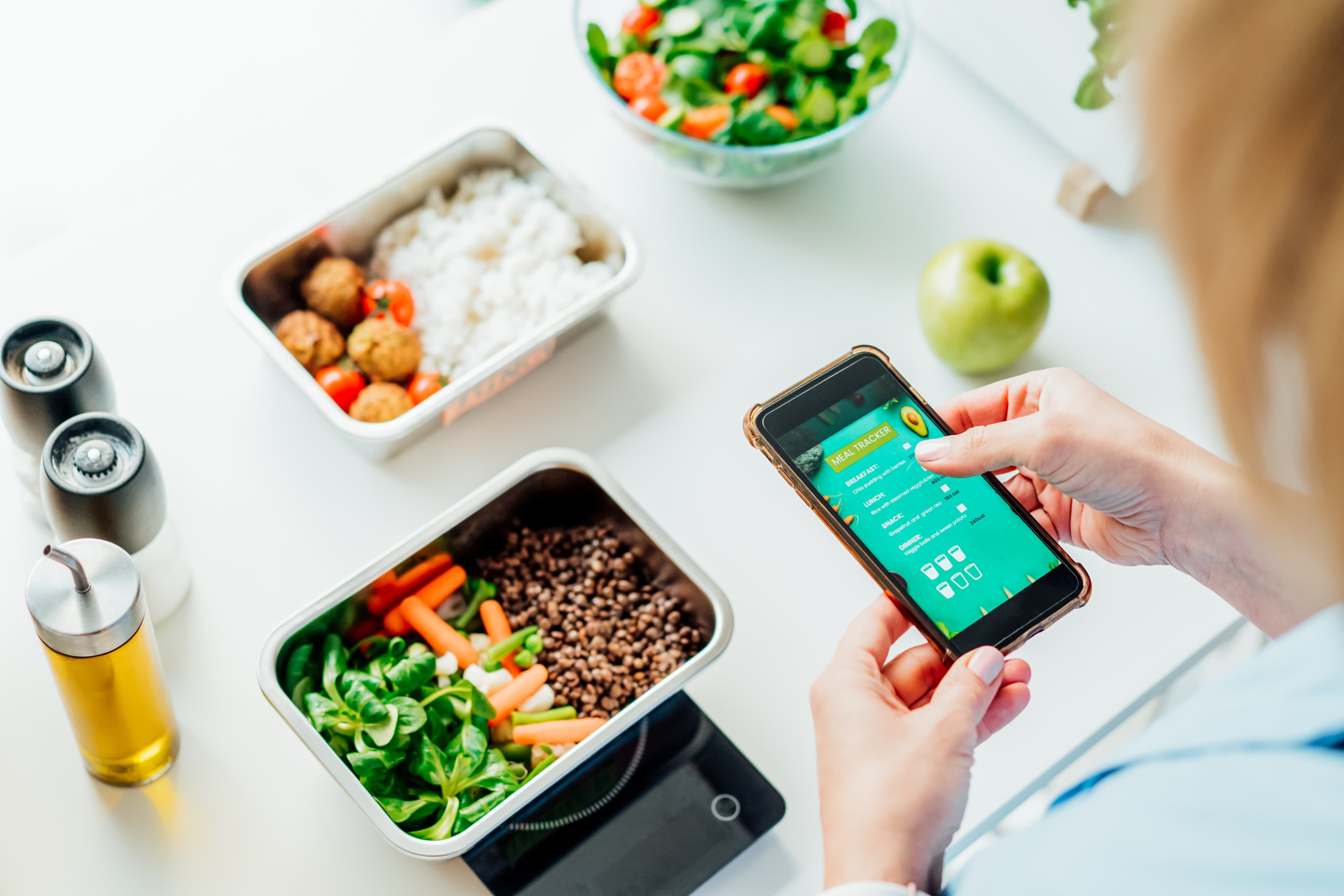 Healthy meal with smartphone tracking app